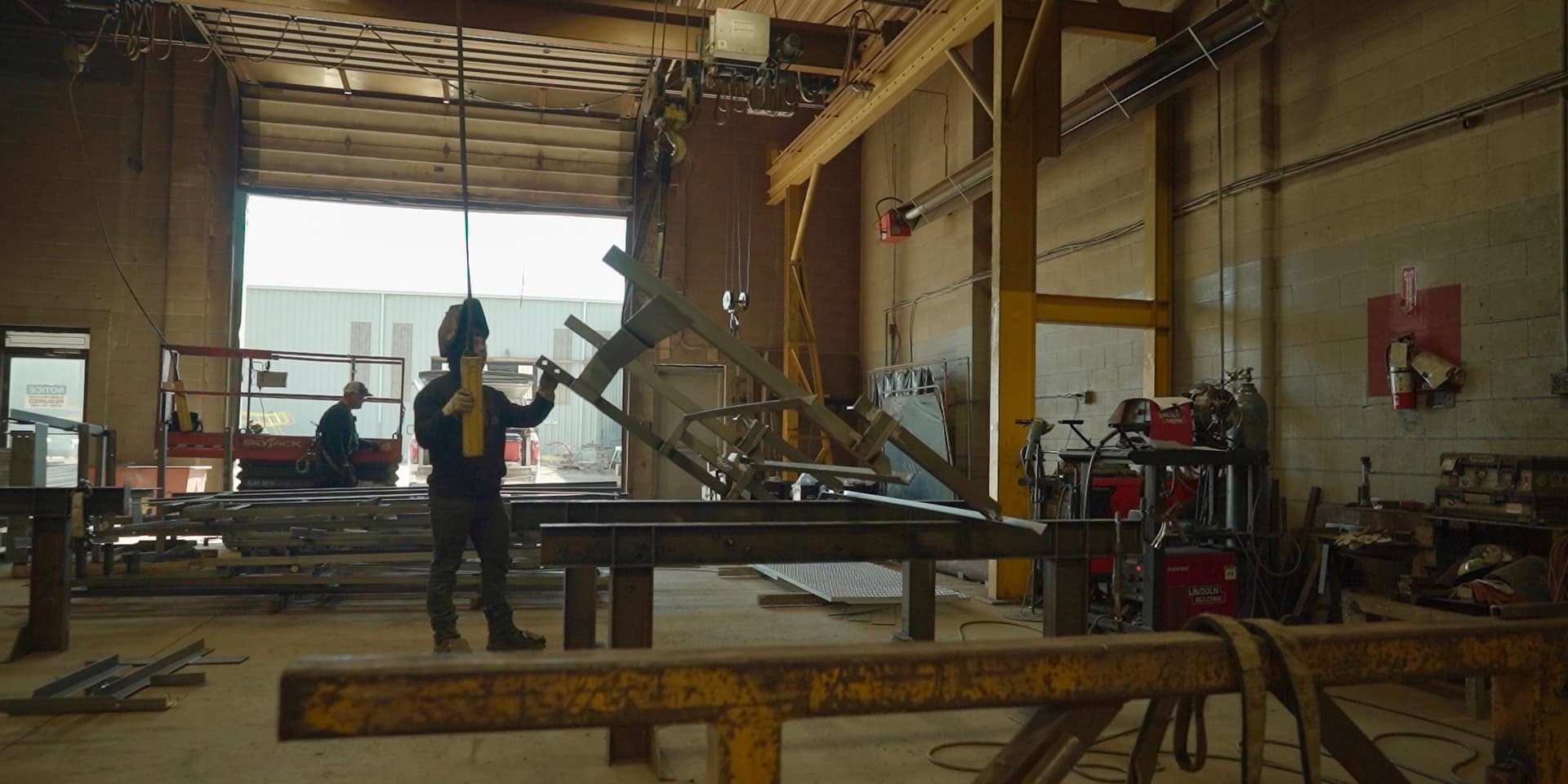 Crane lift in the fabrication bay